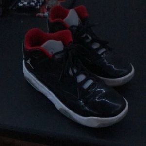 Jordan’s black gray and red